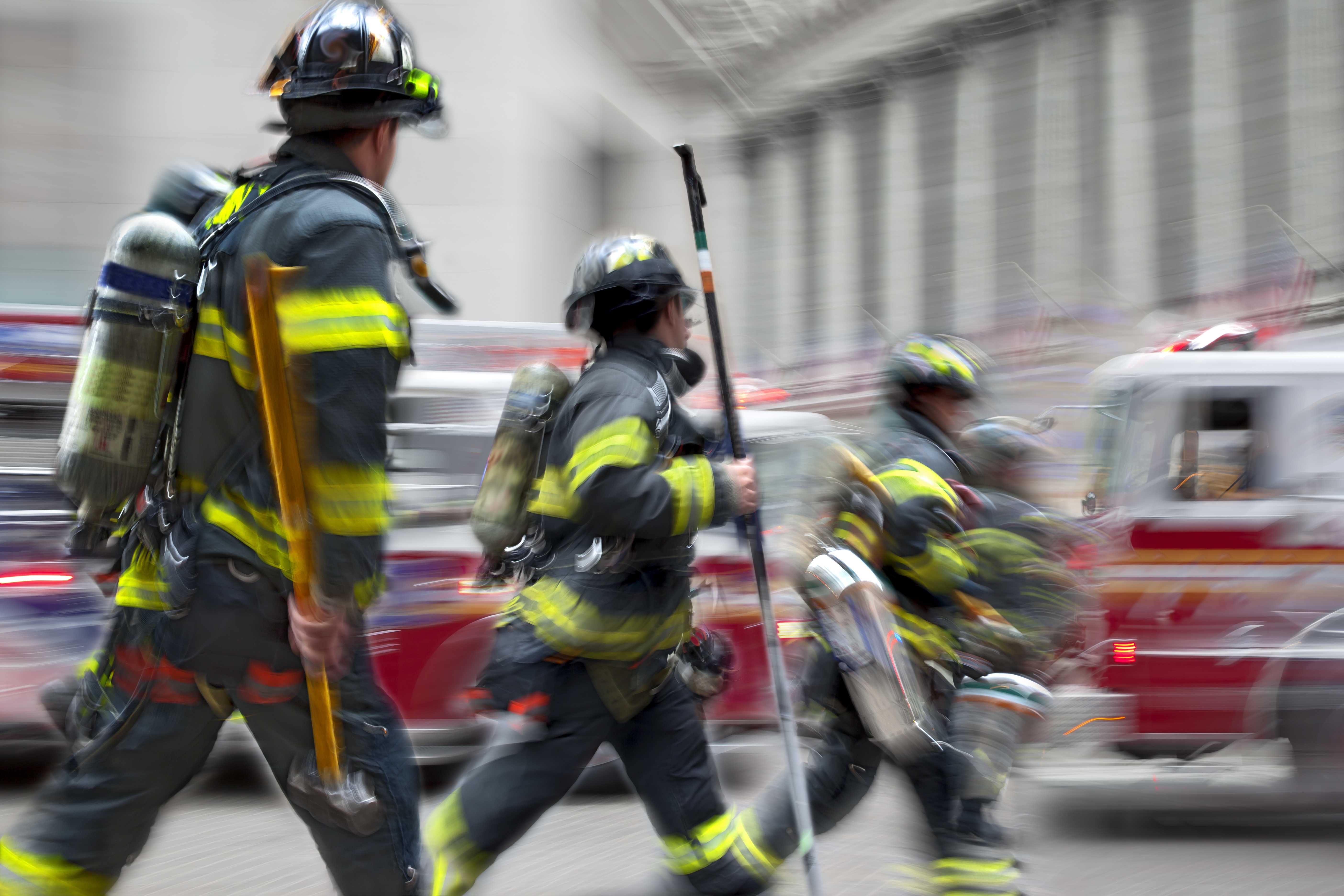 Firefighter turnout gear on a rack